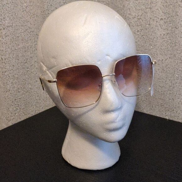 Sunglasses with gold trim - Picture 1 of 2
